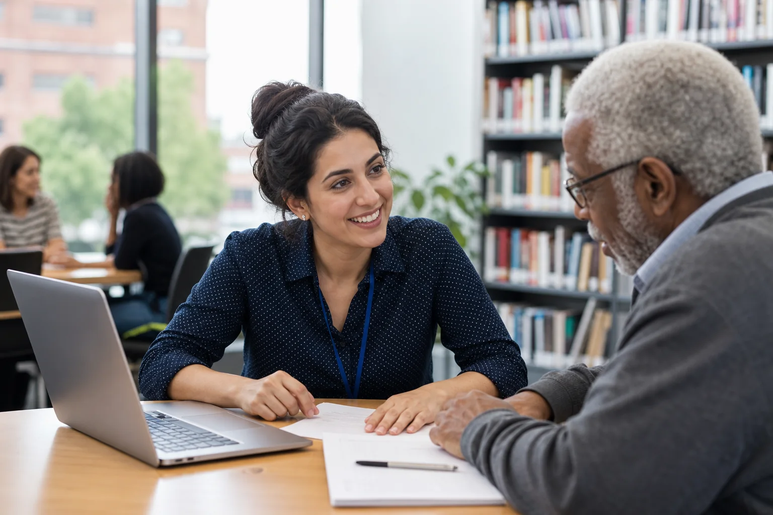Older London resident receiving free will-writing guidance at a community library